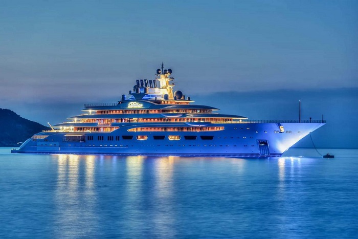 Dilbar superyacht by night